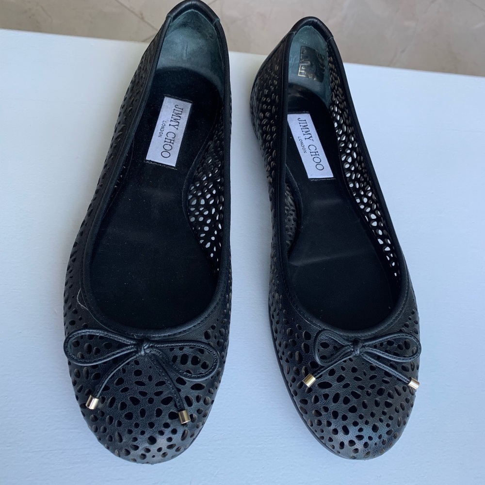 Jimmy Choo perforated nappa leather flats.
